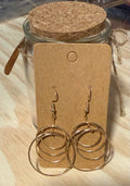 Gold Circular Dangling Earrings